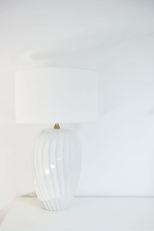 White ribbed ceramic table lamp in modern Roma hotel room at CefalHome