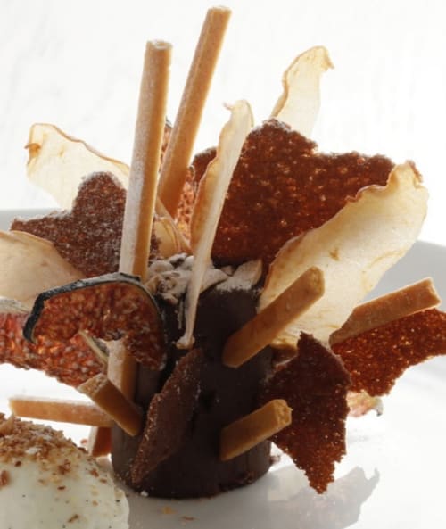 Elegant chocolate dessert with wafer cookies and cocoa at Domaine de l'Ocrerie, Pourrain