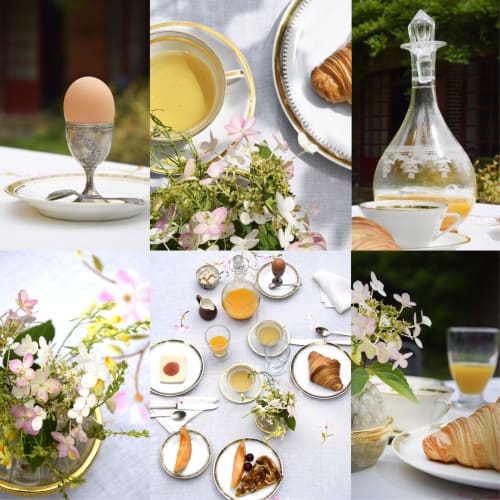 Elegante desayuno en Domaine de l'Ocrerie con cruasanes, flores frescas, zumo y mesa impecablemente servida