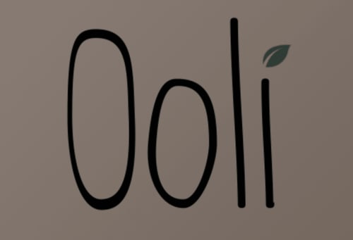 Domaine de l'Ocrerie logo with leaf accent, boutique B&B in Pourrain, France