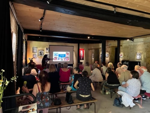 Guests at Domaine de l'Ocrerie enjoying a presentation event in Pourrain, France