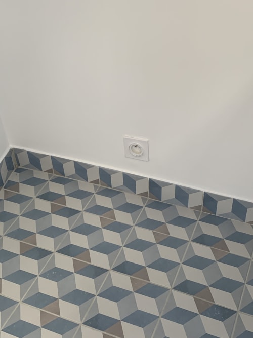 Geometric patterned ceiling detail in Simone sur Mer cottage at Les Filles du Bord de Mer, Port-en-Bessin