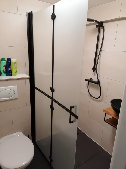 The shower and the toilet.