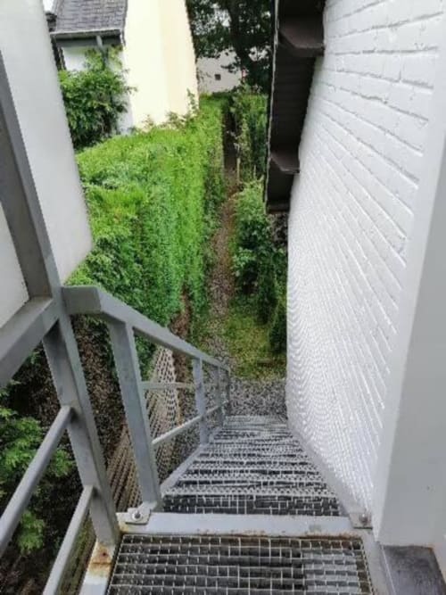 The staircase and private walkway from the street.