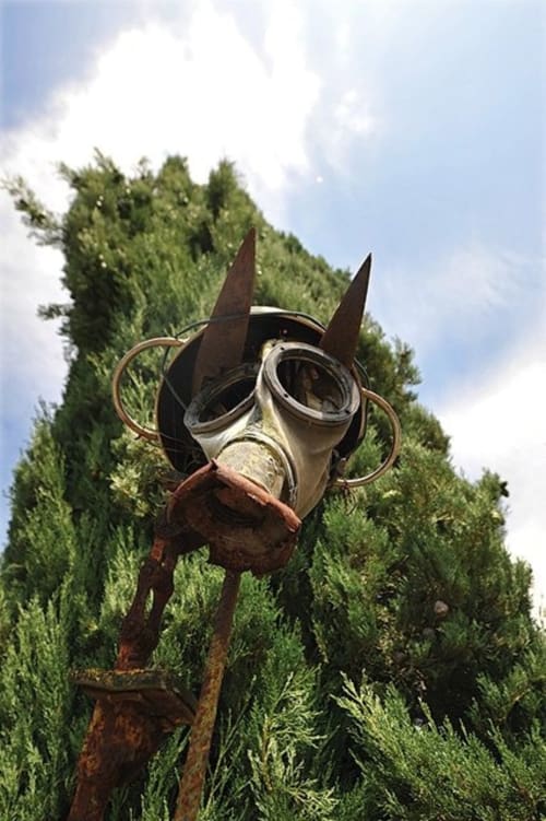 Sustainable art made from recycled iron, part of the artistic garden at Agriturismo Quarantallina