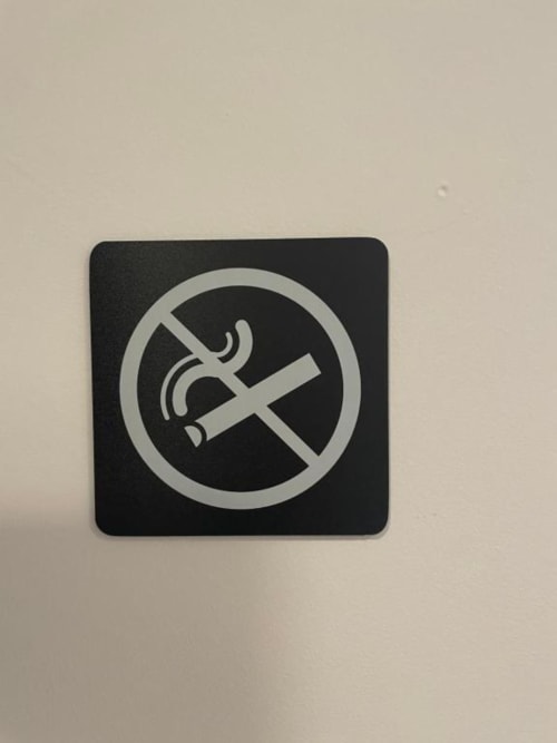 No smoking sign at Catalogna10 Rooms e Loft, Alghero hotel room indicating smoke-free accommodation policy