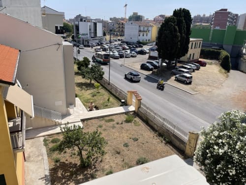 Vista urbana da Rigiariloo Home Apartments a San Giacomo degli Schiavoni con parcheggio ed edifici residenziali