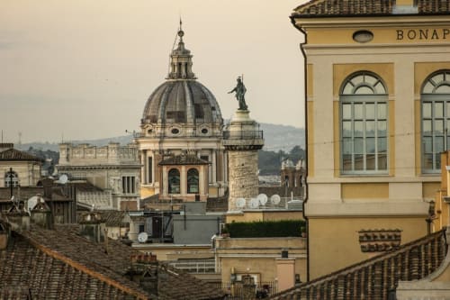 Hotel Fiori Rome view of historic dome and rooftops in Italian architecture