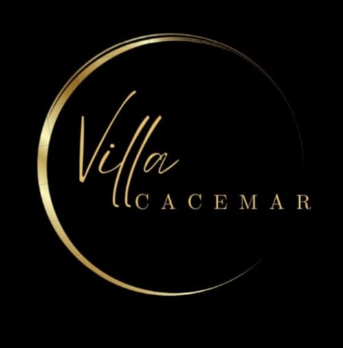 Logo del hotel de lujo Villa Cacemar en dorado sobre negro, Maspalomas Las Palmas