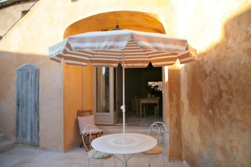 The Music Room apartment patio at Ancienne Maison Des Gardes