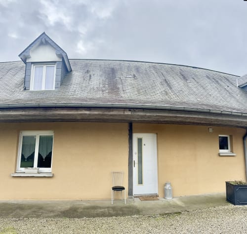 Yellow cottage Le Clos 4 at Le Clos De La Vallée, Bellengreville, with dormer window and white door