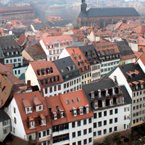 Vue aérienne des toits en terre cuite de Saxe et de son architecture historique en Suisse, près du Chalet d'hôtes Les Louettes