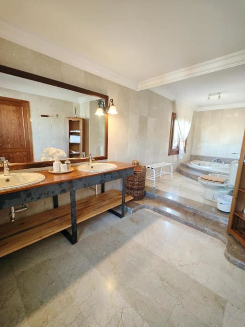 baño vistas jardín