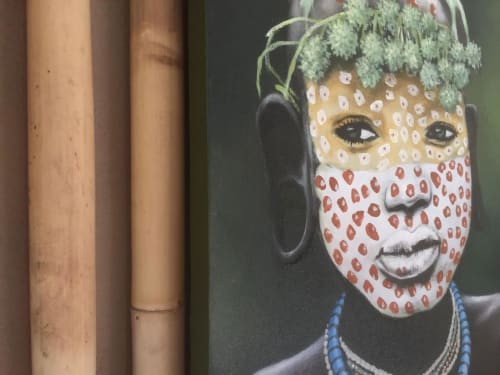 Artistic portrait with traditional face paint at AJOUCADOU guesthouse in Lourmarin