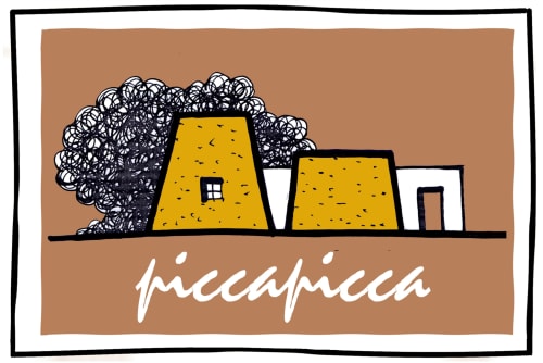 Masseria Picca Picca B&B a Morciano di Leuca, Italia - architettura in pietra tradizionale con edifici gialli e antico albero
