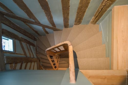Wooden staircase with beamed ceiling in Pierre and Valérie cottage, Honfleur
