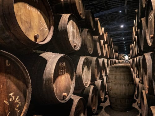 Wine barrels in cellar at Bungalow Buda Beach, Chipiona, Spain