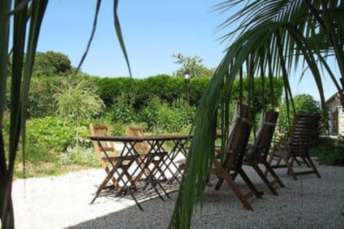 Terrasse à l'arrière de la maison