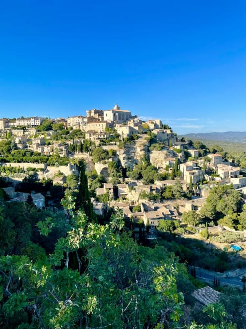 Hilltop village Morières-lès-Avignon with historic stone buildings and cypress trees, Domaine des Lavarines location