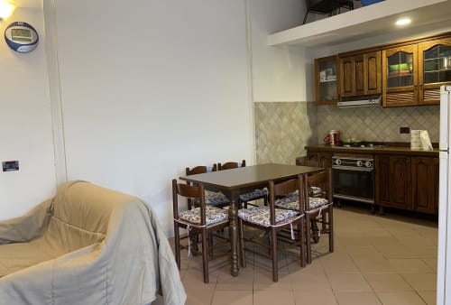Accogliente cucina e zona pranzo dell'Appartamento Rigiariloo Home a San Giacomo degli Schiavoni, Italia