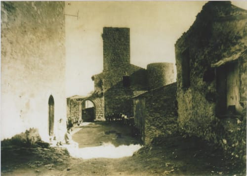Historic stone ruins with ivy-covered walls at La Sentinelle B&B in Les Arcs sur Argens, France