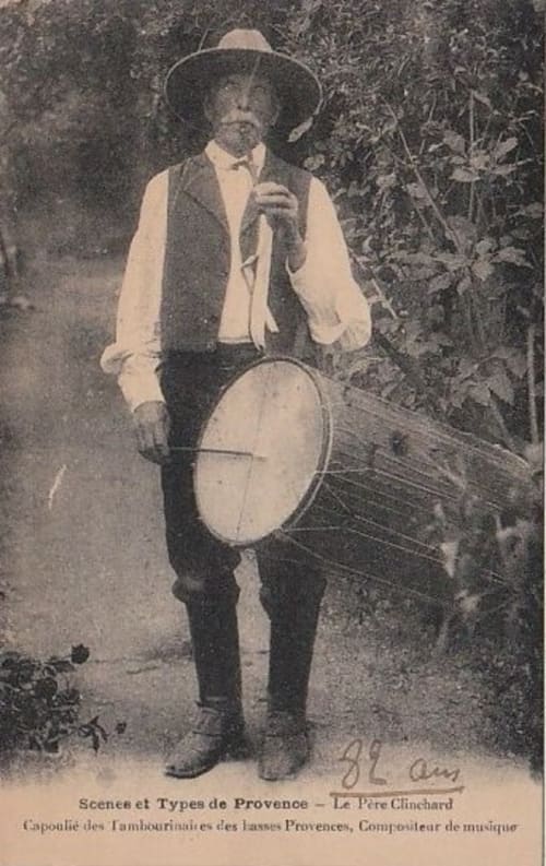 Vintage Provence musician with tambourine and drum, traditional folk performer from Les Arcs, France
