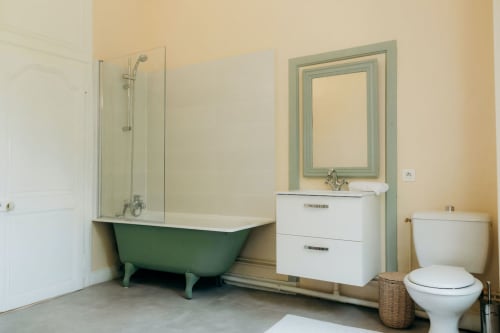 Old bathroom with clawfoot bathtub