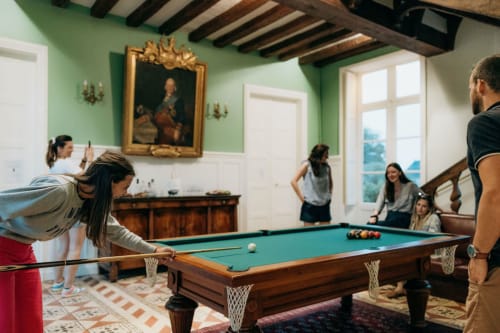 A game of pool between girls