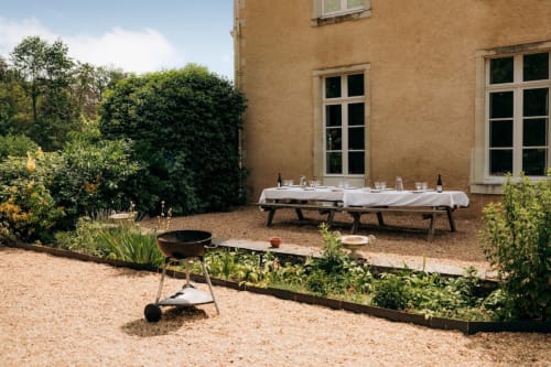 Group cottage with banquet table and barbecue