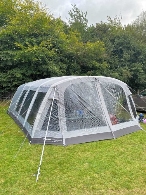 Large inflatable camping tent pitched on grass at Postwood Gardens Campsite, Kentisbeare