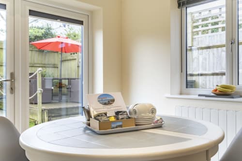 Welcome pack at Meadow Rise, a delightful Cornish holiday property nestled in the idyllic village of St Columb Major, Cornwall. This thoughtful gesture includes local biscuits, tea, coffee, milk and squash, along with a bottle of wine in the fridge; to ensure guests have a memorable stay. Discover the best of Cornwall with our curated welcome pack, designed to enhance your holiday experience.