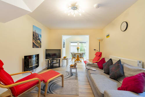 Inviting view from the lounge through to the dining room at Meadow Rise, a picturesque Cornish holiday property nestled in the serene village of St Columb Major, Cornwall. Admire the seamless flow between spaces as natural light illuminates the cozy interiors, creating a warm and welcoming ambiance. Experience the charm of Cornish countryside living from every angle of this delightful holiday retreat.