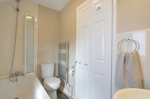 Modern and stylish bathroom at Meadow Rise, a delightful Cornish holiday property nestled in the serene village of St Columb Major, Cornwall. Immerse yourself in luxury with sleek fixtures and elegant design, offering a rejuvenating space to unwind after a day of exploring. Experience the ultimate in comfort and relaxation amidst the beauty of the Cornish countryside.