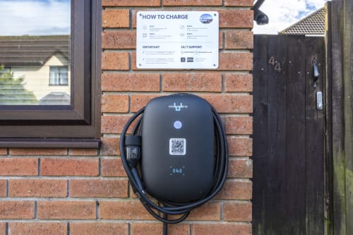 Convenient outside electric car charger at Meadow Rise, a sustainable Cornish holiday property situated in the scenic village of St Columb Major, Cornwall. Enhance your eco-friendly travel experience with this modern amenity, providing hassle-free charging for electric vehicles. Stay committed to sustainability while exploring the beauty of Cornwall's countryside during your holiday getaway.