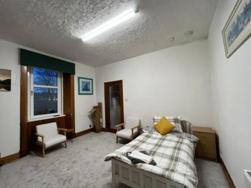 large room with single bed