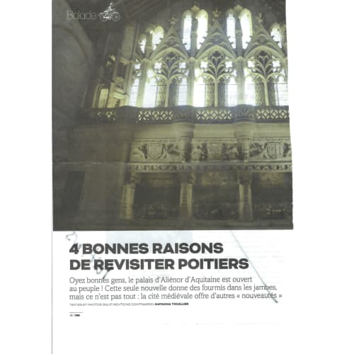 Gothic arched windows and ornate stonework in historic Poitiers cathedral interior