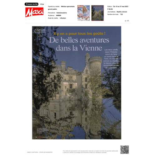 Neuschwanstein Castle reflected in water, featured in Maxi magazine's Vienne tourism article