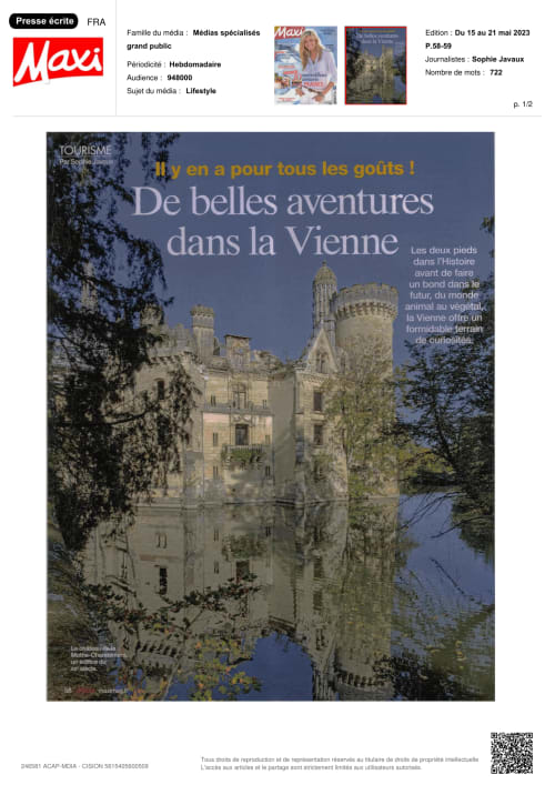 Neuschwanstein Castle reflected in water surrounded by trees, featured in Maxi magazine travel guide