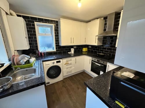 Large Shared kitchen and living room area