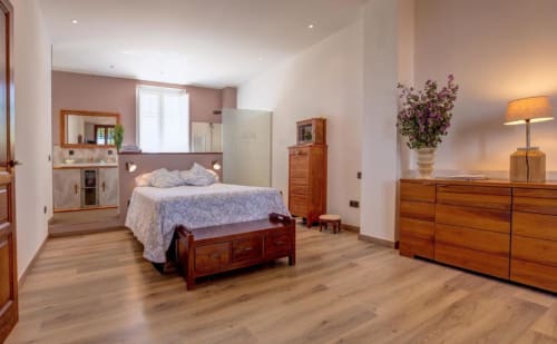 Spacious Superior Double Room at Finca Almenara De Copau in Zaragoza with wooden furniture, garden views, and en-suite