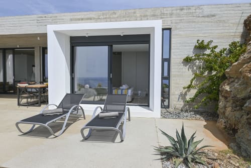 Relax on the terraces of dream cave villa, located in a protected area of ​​Tinos island, overlooking the Aegean Sea with fantastic views and a luxurious and elegant design.