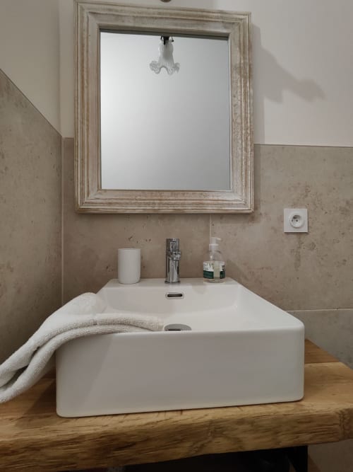 Private bathroom sink in the Cèdre room at Le Rêve d’Alice, elegant countryside bed and breakfast in Gers