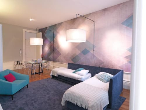Modern Superior Apartment at New Oporto Apartments in Porto featuring twin beds, turquoise sofa, dining area, and