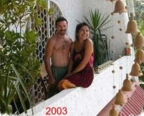 Two guests relaxing in tropical garden at Villa Mango B&B, Nosara Costa Rica, 2003