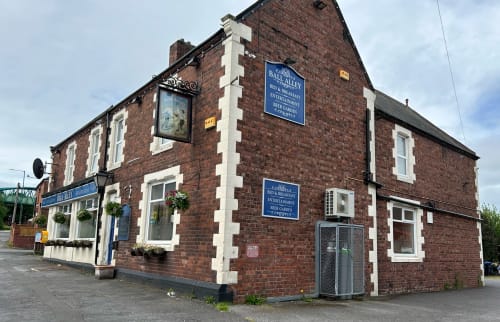The Ball Alley pub and bed & breakfast in Stanley, County Durham, a brick building with white trim and blue signage