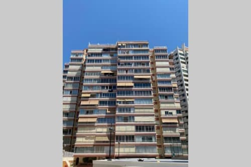 Modern residential building in Benidorm with balconies, Lidersol Apartments city view accommodation