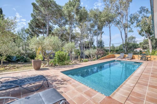 Private pool with terrace overlooking Mediterranean garden at beachfront cottage in Palafrugell