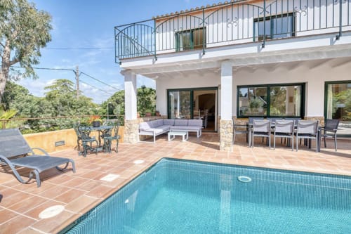Modern cottage in Palafrugell with private pool, terrace seating, and ocean view balcony