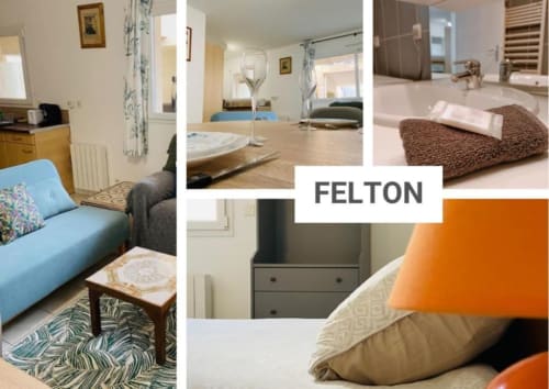 Appartement Felton à La Conciergerie de Nathalie à Dinan avec canapé bleu, table en bois, salle de bain et serviettes marron