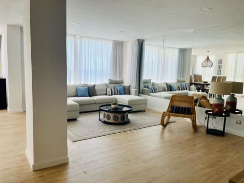 Modern family suite living area with sea view, light furnishings, and spacious layout at Sunset ocean view hotel, Arguineguín